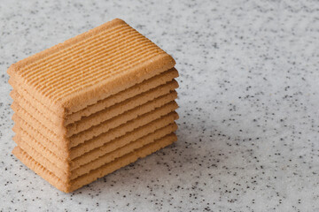 Rectangular shortbread cookies on a light marble top. Homemade baking.
