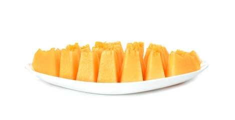 Orange cantaloupe melon fruit sliced on dish isolated on white background