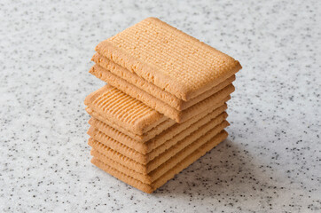 Rectangular shortbread cookies on a light marble top. Homemade baking.