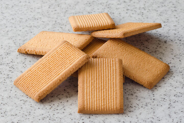 Rectangular shortbread cookies on a light marble top. Homemade baking.