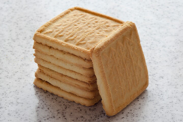 Rectangular shortbread cookies on a light marble top. Homemade baking.