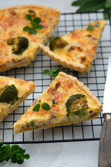Quiche with broccoli and chicken. French open pie.
