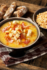 Bowl  with  pea soup and   croutons
