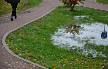 too compact and impermeable soil does not absorb water during rains and floods. a lake was created...