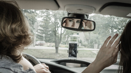 Fototapeta na wymiar Man and woman in car