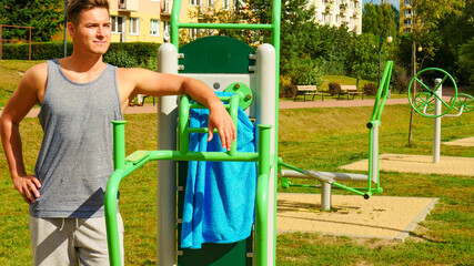 Fototapeta premium Young man relaxing after outdoor workout