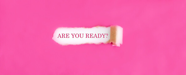 Torn paper with word Are you ready