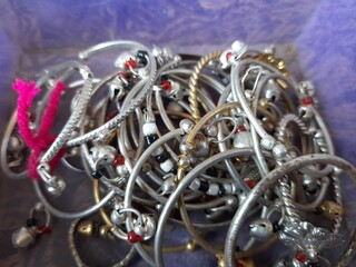The child's steel bracelet is kept in the shop for sale. Small bracelet of baby. 