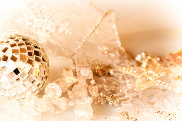 Golden shiny Christmas ornaments, holidays background, seasons greeting card