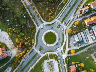 autumn roundabout with traffic top aerial drone view - obrazy, fototapety, plakaty