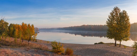 Panorama of plain river with sandy bank autumn at sunrise