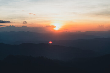 Sunset and mountains in the evening in the forest