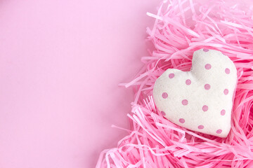 Pink Valentine's Day background. Happy holiday greetings concept. Place for text. Flat layout.