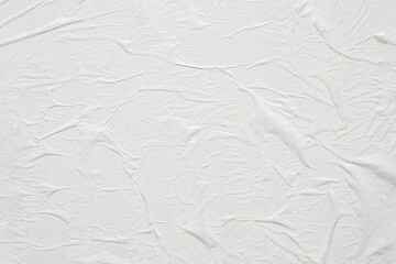 Blank white crumpled and creased paper poster texture background