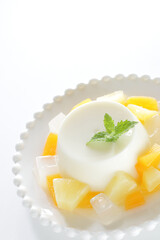 mixed fruit and milk jelly with herbal mint with copy space