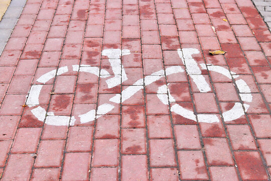Bicycle lane mark. White sign for bicycle. Bike path with a symbol of bike.