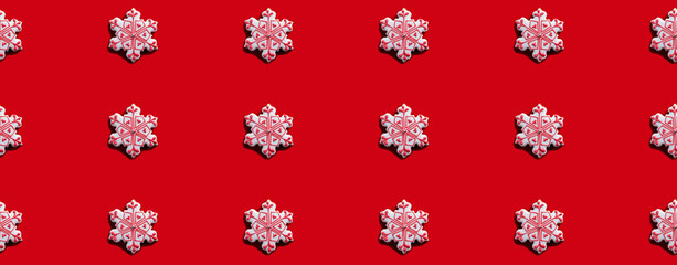 Red Xmas background. Snowflake seamless pattern. Winter holidays decoration. White pink ornament minimalist symmetrical composition isolated on bright.