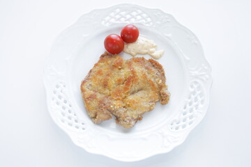 Homemade Milino cutlet on dish with copy space
