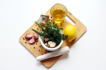 mortar filled with fresh herbs