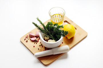 mortar filled with fresh herbs