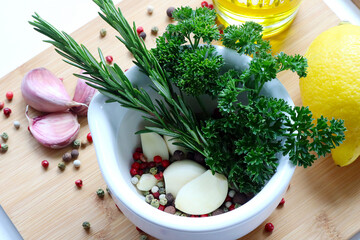 mortar filled with fresh herbs
