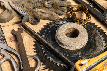 Old vintage household hand tools still life on a wooden background in a DIY and repair concept