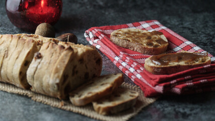French figs bread on a white and red cloth with chestnuts on the side