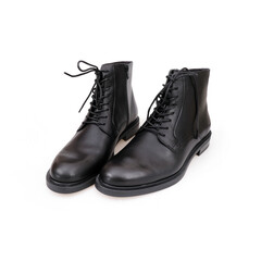 Fashionable black boots for men and women isolated on white background