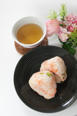 Japanese food, mixed salmon and rice ball on dish for nutrition breakfast