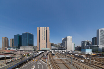 Fototapeta na wymiar 大阪駅と周辺のビル群