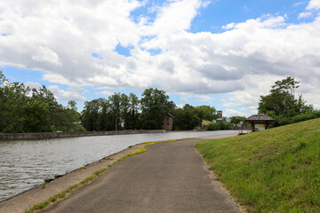 Fototapeta na wymiar Erie Canal at Medina, New York. Tow path hiking path along the canal.