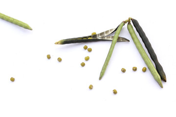 Mung beans and  pods isolated on white background
