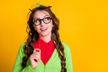 Photo of minded geek girl look empty space think wear green shirt isolated bright color background