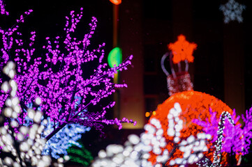 Bright Christmas decorations on urban trees.Decoration of the city