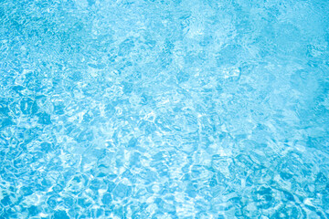 Ripple blue water in the pool background 