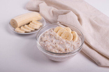 natural vegan oat granola cooked porridge and banana