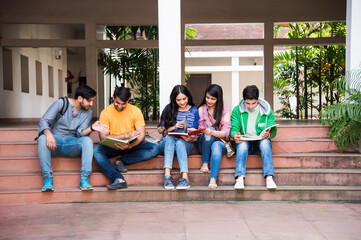 Asian Indian college students doing group study or working on project