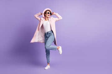 Full size photo of optimistic brown bob hair young woman jump dress sunglass hat coat jeans purple color background