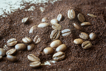 a scattering of ground coffee and coffee beans