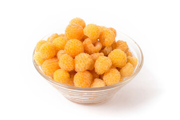 yellow raspberries with leaf isolated on white background macro
