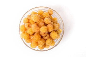 yellow raspberries with leaf isolated on white background macro