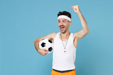 Excited sporty man football player with thin skinny body sportsman in headband shirt shorts whistle...