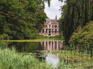 Fototapeta na wymiar Castle Groeneveld in beatiful park in Baarn, the Netherlands