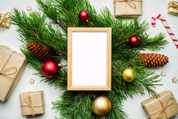 Fototapeta na wymiar New year and christmas concept on wooden background with frame for copy space