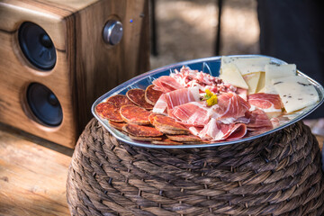 Delicious appertizer catering food in the countryside on wooden table in nice ambient