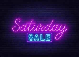 Saturday Sale neon sign on brick wall background .