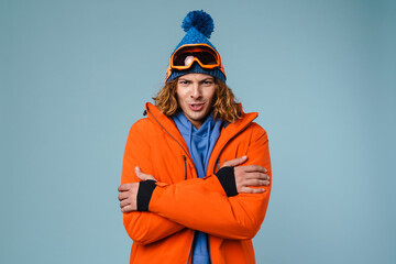 Fototapeta premium Caucasian displeased sportsman posing with palms together