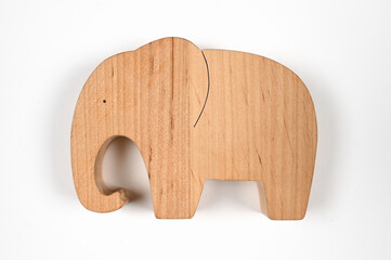 flat wooden elephant on white background