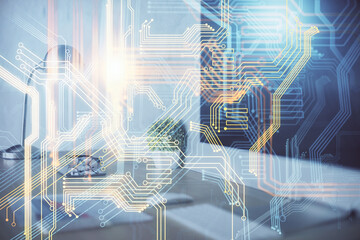 Double exposure of desktop with computer and world map hologram. International data network concept.