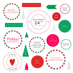 A pukka set of Christmas stickers Secret Santa decorative round postage stamps ribbons packaging embellishments. Heart shapes Christmas trees copy space. Timeless Holiday season colors red green blue